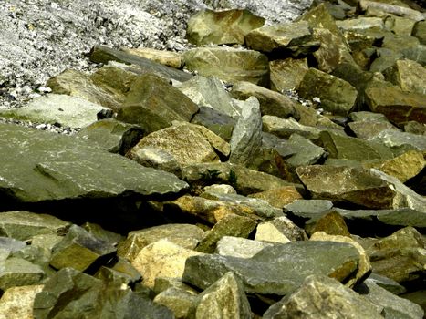 Various and colored stones. Photo taken in mountains, in summer. 