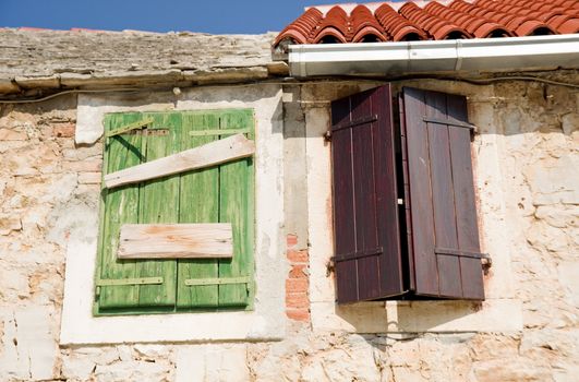 Two color windows of Croatia old house