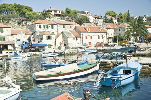 The boats in the small harbor in Adriatic sea, Croatia