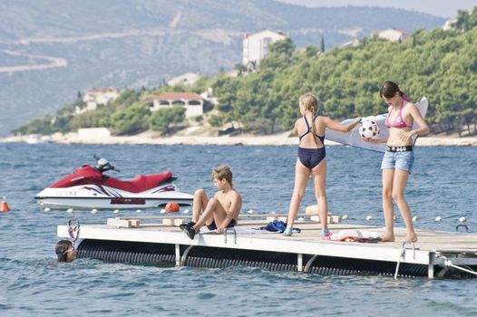 People have a rest at coast of Adriatic sea in Croatia 