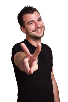 Young man executive gesturing a victory sign