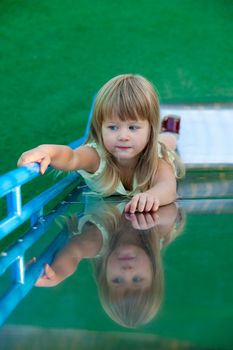 people series: little girl play on the chute