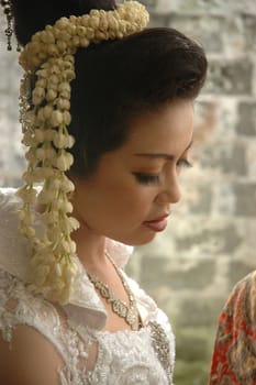 bride wearing traditional costume from west java-indonesia