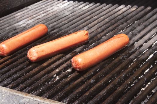 Hot dogs on a bbq