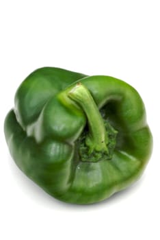 Single green sweet pepper isolated on white