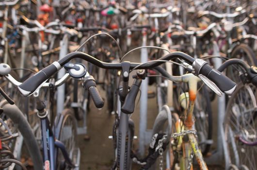 Detail of a bicycle parked on a bike parking 