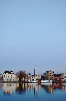 Sailing ship moored at the harbor of Hooikade in Delft, Holland