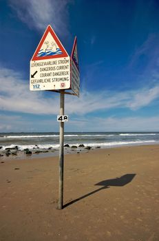 Swimming restriction sign on a Dutch beach in summer