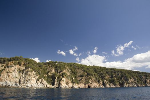 Mediterranean linecost with blue sky. Plenty of space for copy.