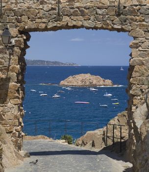 View of the Mediterranean Sea from a castle gate.