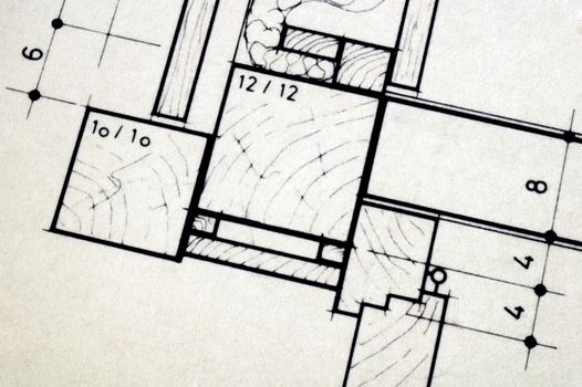 Close up detail of architect's plans for a house. Space for text in the bottom left-hand corner.