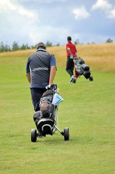 golf player and grass green