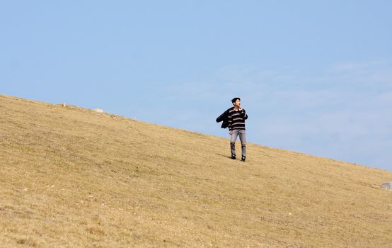 man walking on the mountain