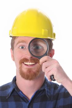 construction worker with loupe on white background 