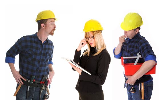 angry businesswoman and construction workers with architectural plans