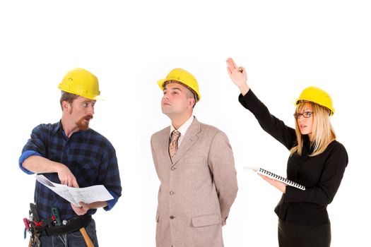 angry businesswoman,  businessman and construction workers with architectural plans