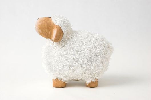 Easter decoration, a statuette of a smiling sheep