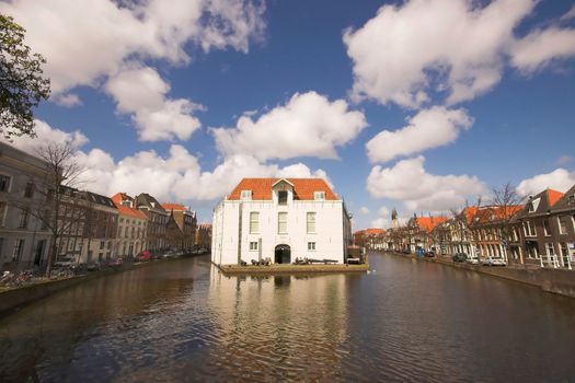 Old fortification building at the edge of a canal in Delft, Holland