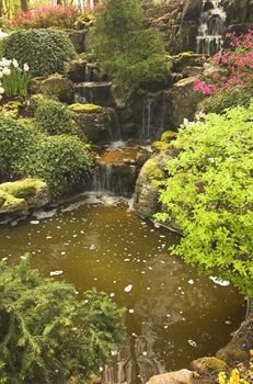 Decorative waterfall on a warm Spring day, part of the Keukenhof exhibition in Holland