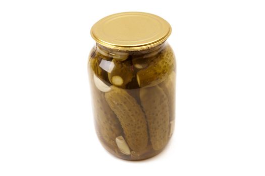 Tree clear glass jar of green pickled cucumbers. Isolated image