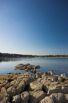 Rocky croatian beach in the area of Umag, Adriatic sea