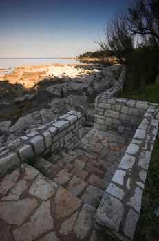 Rocky croatian beach in the area of Umag, Adriatic sea