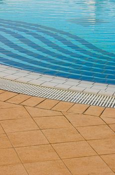 Detail of a white tiled swimming pool