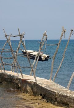 Croatian shore, wooden holders used for lifting boats