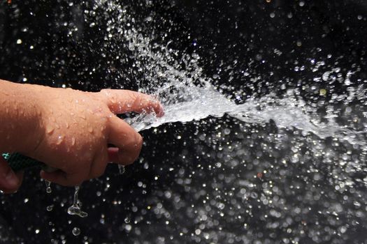 Child playing with water