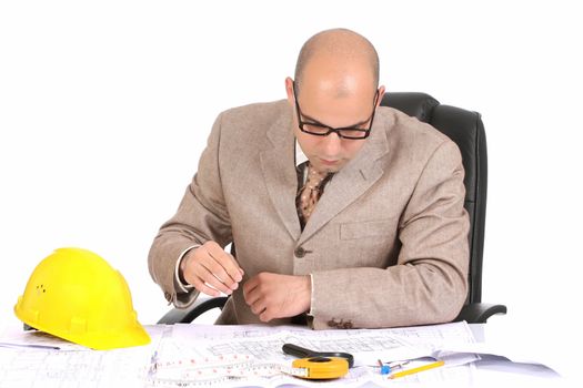 A Businessman working with architectural plans