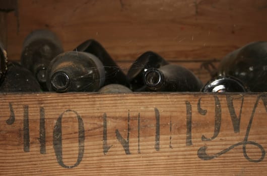 old beer bottles in a vacuum oil box