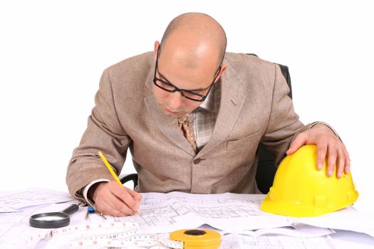 A Businessman working with architectural plans