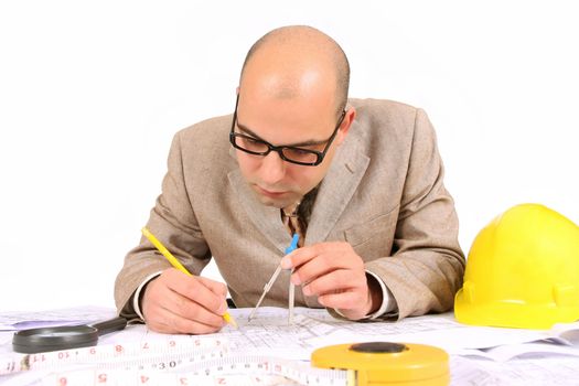 A Businessman working with architectural plans
