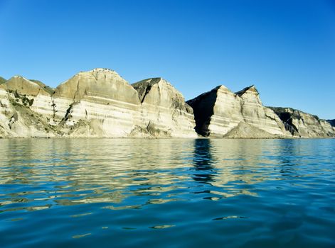 The fault lines and sedimentary layers are visible in the cliffs of Cape Kidnappers in Hawke Bay, New Zealand