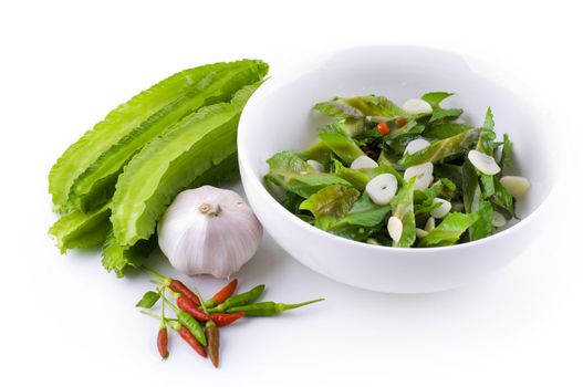 Stir Fried Winged beans on white background.