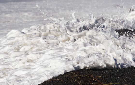 Splashing waves at Haumoana Beach, Hawke's Bay, New Zealand