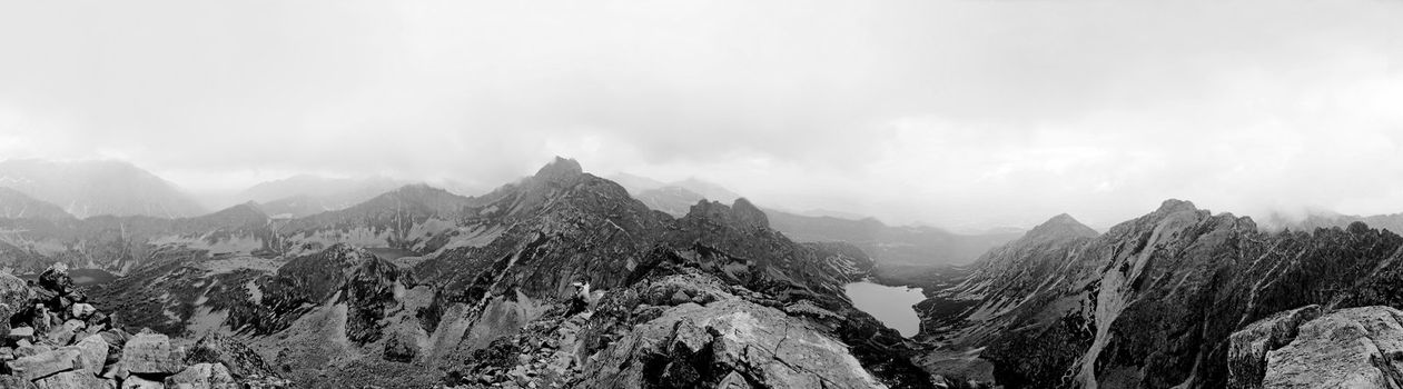 Panorama of Polish Tatra mountains on an overcast day