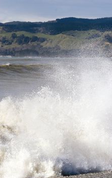 Splashing waves at Haumoana Beach, Hawke's Bay, New Zealand