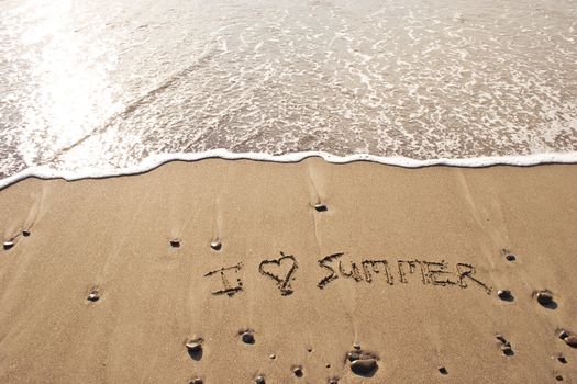 I love summer written in the sand at Haumoana Beach, Hawke's Bay, New Zealand