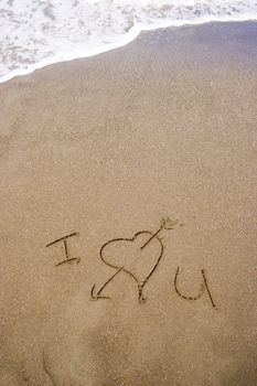 I love you written in the sand.