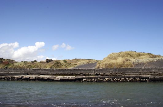 Sea wall at the river mouth at Patea, Taranaki, New Zealand