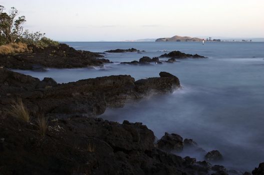 Rocks at Rangitoto Island, Hauraki Gulf, New Zealand. Taken with slow shutter speed.