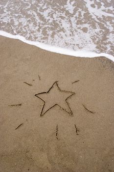 Christmas star in the sand. A summer Christmas in the Southern Hemisphere.