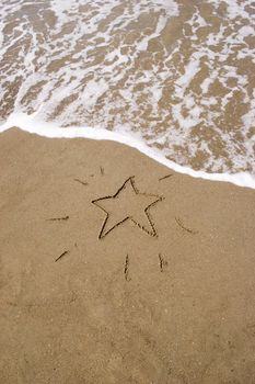 Christmas star in the sand. A summer Christmas in the Southern Hemisphere.