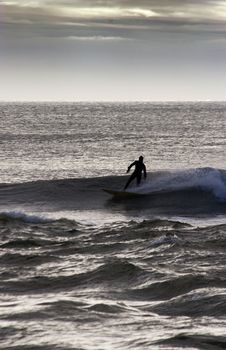 Surfing the break at Haumoana Beach, Hawke's Bay, New Zealand