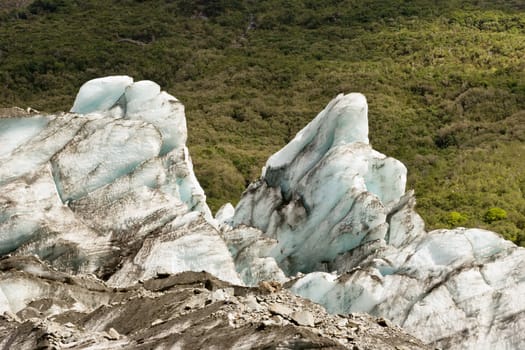 Close up of the Fox Glacier on the West Coast of the South Island, New Zealand. A frozen river of stone and ice.