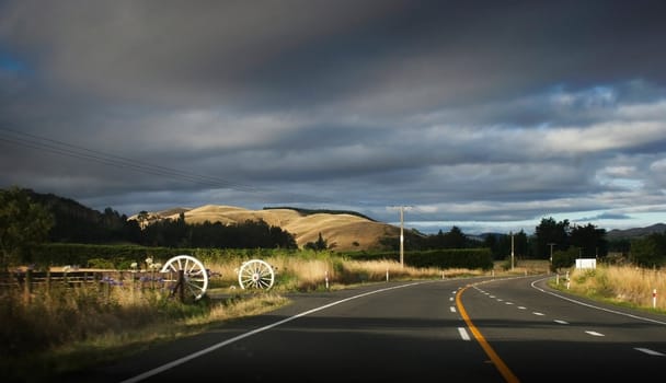 Darkening sky over Highway 50, Waipawa, New Zealand