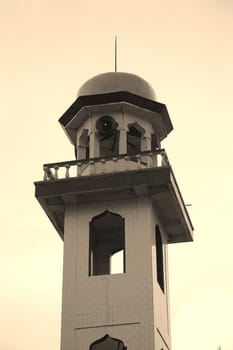masjid tower with arabic decorative style