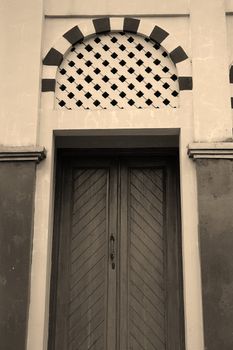 wooden door for entering masjid hall
