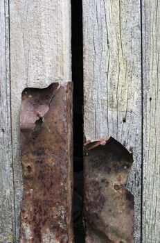 Rusty crack in the door